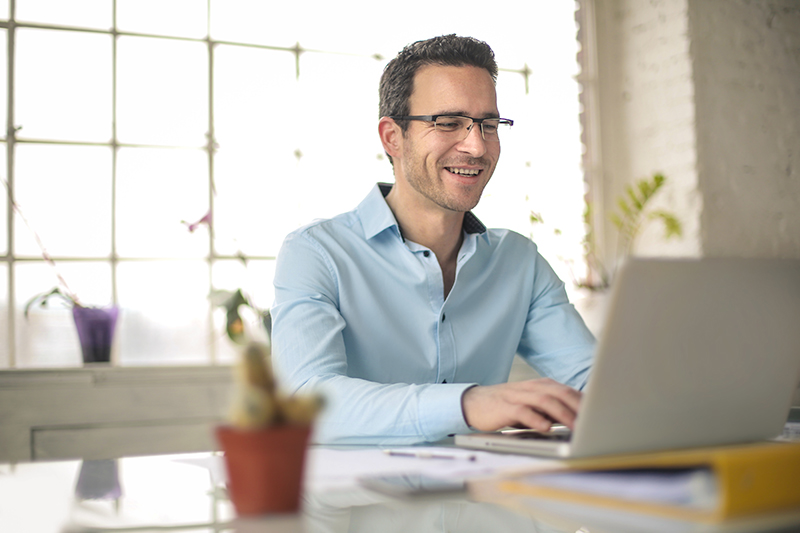 Successful businessman working with his laptop